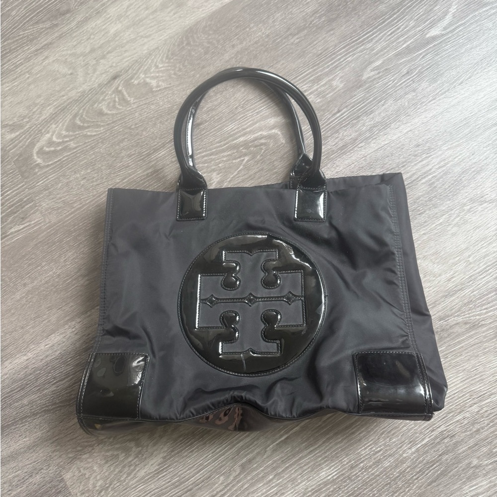 Tory Burch Elegant Black Tote with Cream Interior and Gold Details